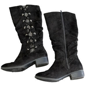 - WOMAN’S tall boots